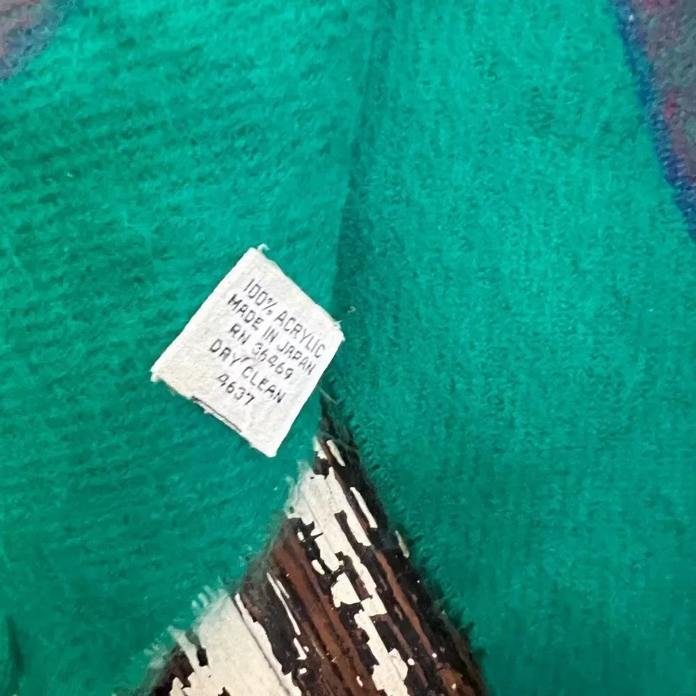 EUC vintage Women’s Acrylic multi colored scarf. Made in Japan.